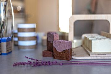 Layout and packaging of fresh prepared handmade soap and cosmetics for body skin care. Home spa. Small business