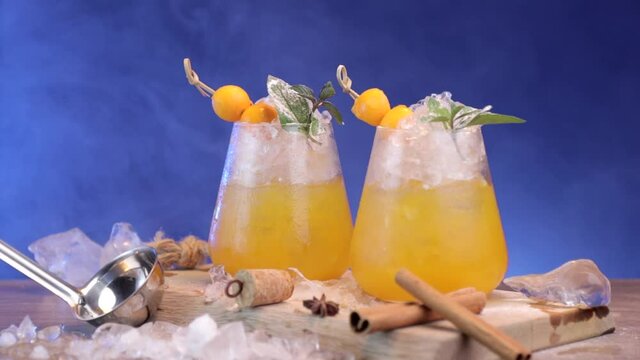 A nice composition of 2 orange cocktails