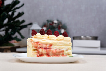 Piece of fruit pie on plate. Cake with berries. Christmas background