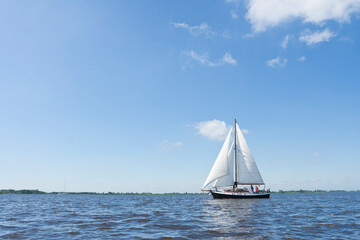 Sailing boat at Sneekermeer
