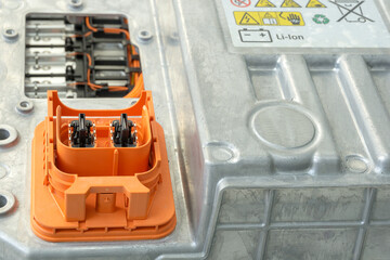 Selective focus of Electric car lithium battery pack and wiring connections internal between cells on background.	