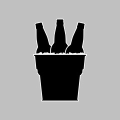 Set of beer bottles in a metal bucket with ice cubes. Black silhouette with white linear outline. Vector drawing and simple icon.