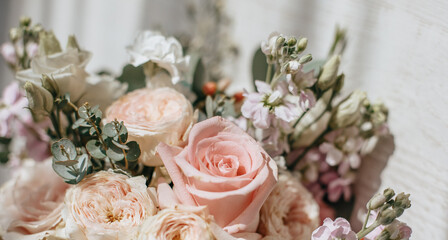 Wedding bouquet of peonies flowers on the floor of the newlyweds
