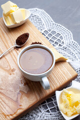 Bulletproof coffee, blended with organic butter and MCT coconut oil, paleo, keto, ketogenic drink breakfast.