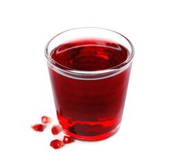 Fresh pomegranate juice in glass and seeds on white background