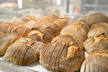 Freshly baked bread. Industrially made baked goods. Selective focus