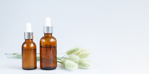 Banner two glass dropper bottles mockup