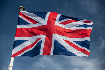 the british flag in blue sky