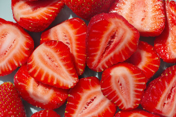 Ripe sliced strawberry, red juicy berries