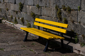 empty yellow bench