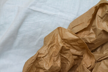 Fototapeta na wymiar crumpled paper. craft paper. texture, background, folds.brown crumpled paper