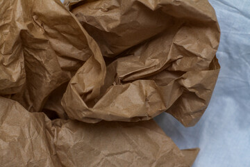  crumpled paper. craft paper. texture, background, folds.brown crumpled paper