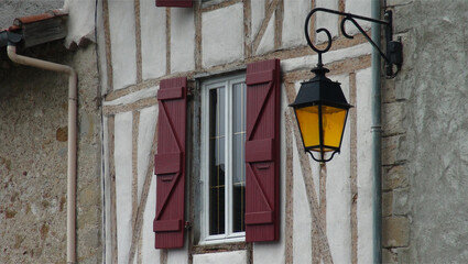 lantern on the wall, traditional window, Le Mas d' Azil, France