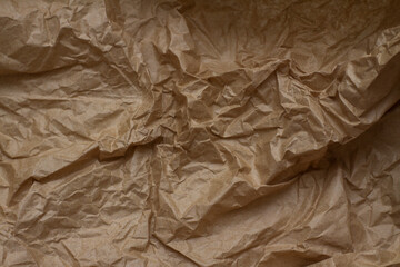  crumpled paper. craft paper. texture, background, folds.brown crumpled paper