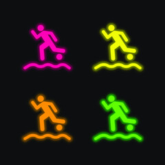 Beach Soccer Player Running With The Ball On The Sand four color glowing neon vector icon