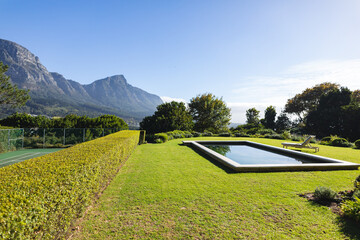 General view of tranquil swimming pool with stunning mountains countryside