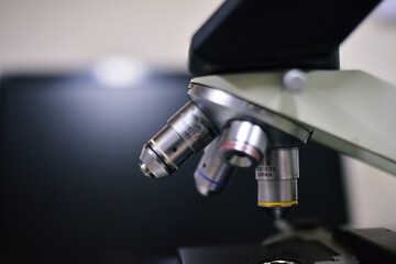Blurred old microscope in laboratoty.