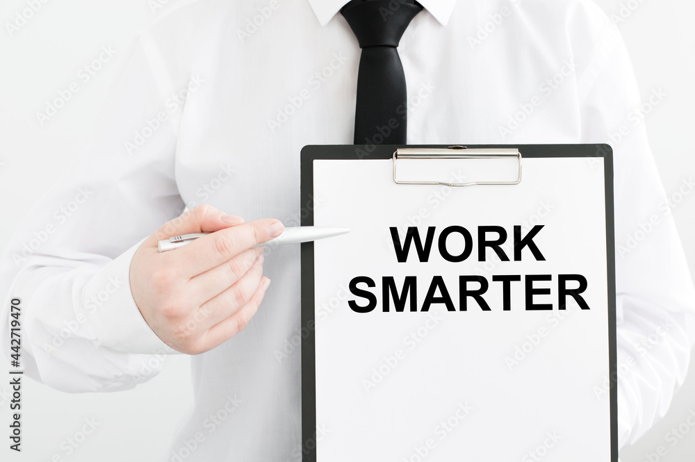 Aufkleber work smarter not harder concept. man holding a card with a motivational message text written on it