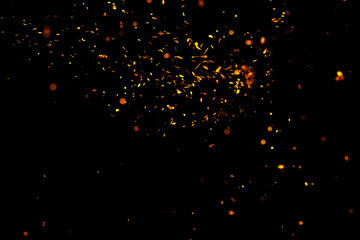 sparks of fire on black background