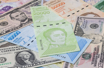 Fototapeta na wymiar Close up to the currency of the south American country Venezuela. High inflation and weak economy increases the denomination of the banknotes. Bolivares or Bolivar money of the republic Venezuela 