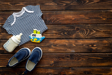 Baby shower. Bodysuit and shoes for newborn boy
