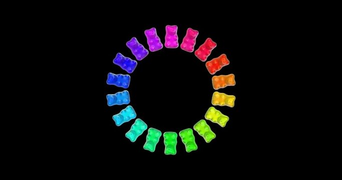 Colored gummy bears with changing colors rotate in a circle on a transparent background with alpha channel