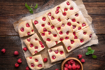 Raspberry cake known as Bublanina sprinkled with powdered sugar