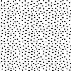 Background polka dot. Seamless pattern. Random dots, circles, animal skin. Design for fabric, wallpaper. Irregular random abstract vector texture. Repeating graphic backdrop