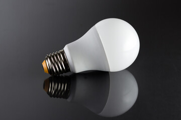 light bulb on black background