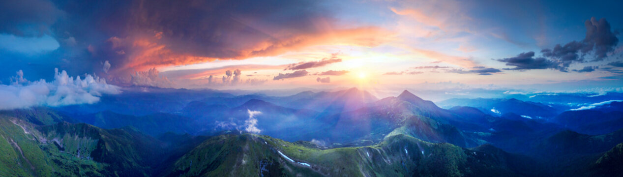 Hoverla flying drone at sunset