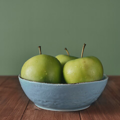 Green apples in a bowl