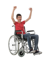 Obraz na płótnie Canvas Emotional teen boy in wheelchair on white background