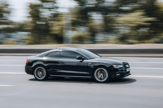 Ukraine, Kyiv - 27 June 2021: Black Audi S5 car moving on the street. Editorial