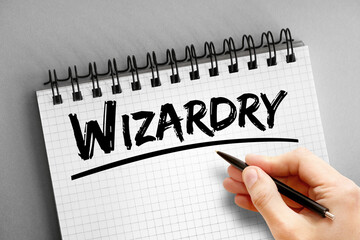 Wizardry text on notepad, concept background