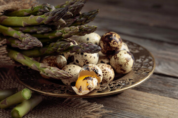Raw asparagus and quail eggs.