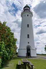 view of the Stevns Lighthouse on the east coast of Denmark on a beautiful summer day