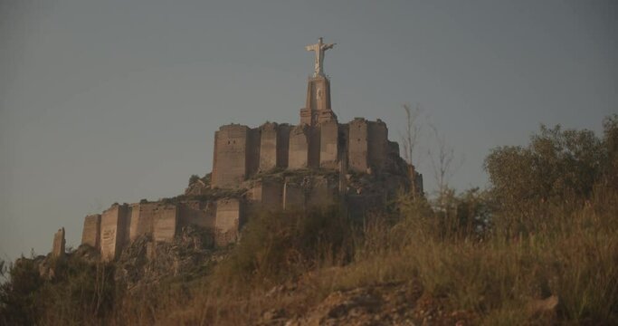 Low Perspective Shot of a Religious Structure on Top Of the Ruins in Spain 