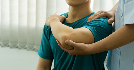 Young man with body aches and fatigue with doctor-assisted care and medical and physical therapy...