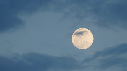Naklejka na ściany i meble Beautiful full moon in the night sky view from Earth.