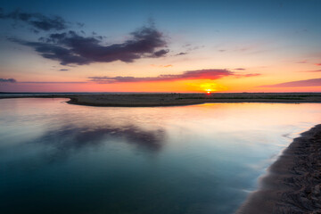 A beautiful sunset on the beach of the Sobieszewo Island at the Baltic Sea. Poland