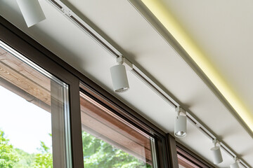 Modern lamps under the ceiling as an interior element.