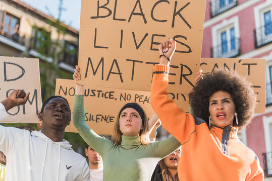 Diverse people during Black Lives Matter protest in city