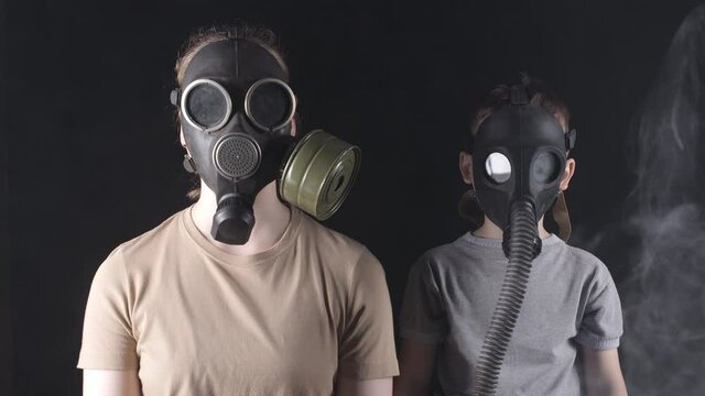 Video of woman and five-year-old boy in gas masks