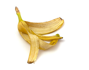 Banana peel for compost isolated on white background close up.