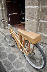 Classic retro vintage antique bamboo bicycle philippine style stop front of local house wait...