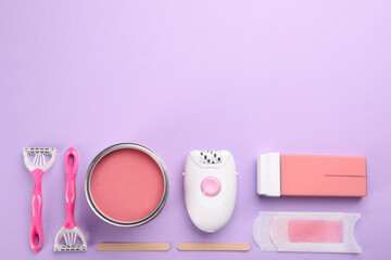 Set of epilation products on lilac background, flat lay. Space for text