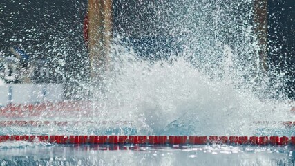 Swim Race: Two Professional Swimmers Diving in Swimming Pool. Athletes Compete, Gracefully Jump, Each Determined to Win Championship. Slow Motion with Stylish Colors, Artistic Aerial
