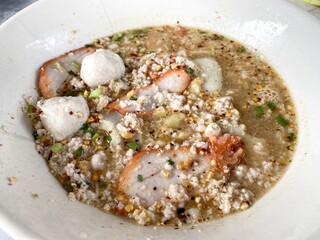 tom yum noodle on table