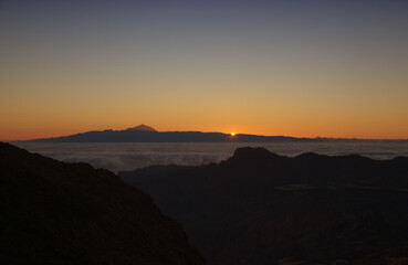 Gran Canaria, landscape of the central part of the island, Las Cumbres, ie The Summits, short hike between rock Formation 
Chimirique and iconic Roque Nublo, evening light
