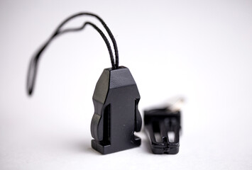 a black plastic lock is isolated on a white background